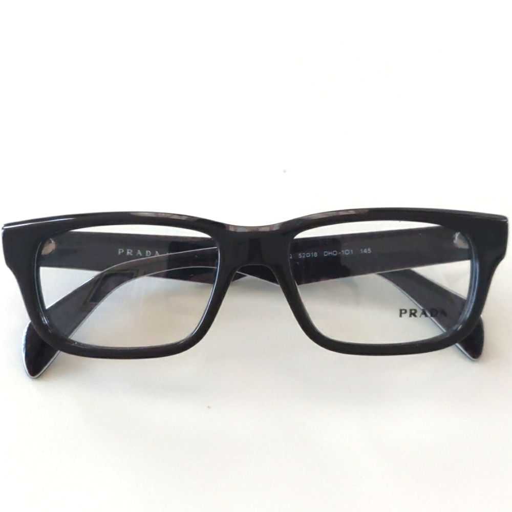 Prada 11QV Glasses. Dark Brown. 52-18-145